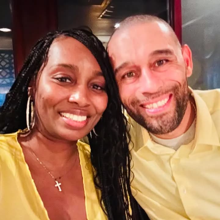Apostle and First Lady Currie, smiling together